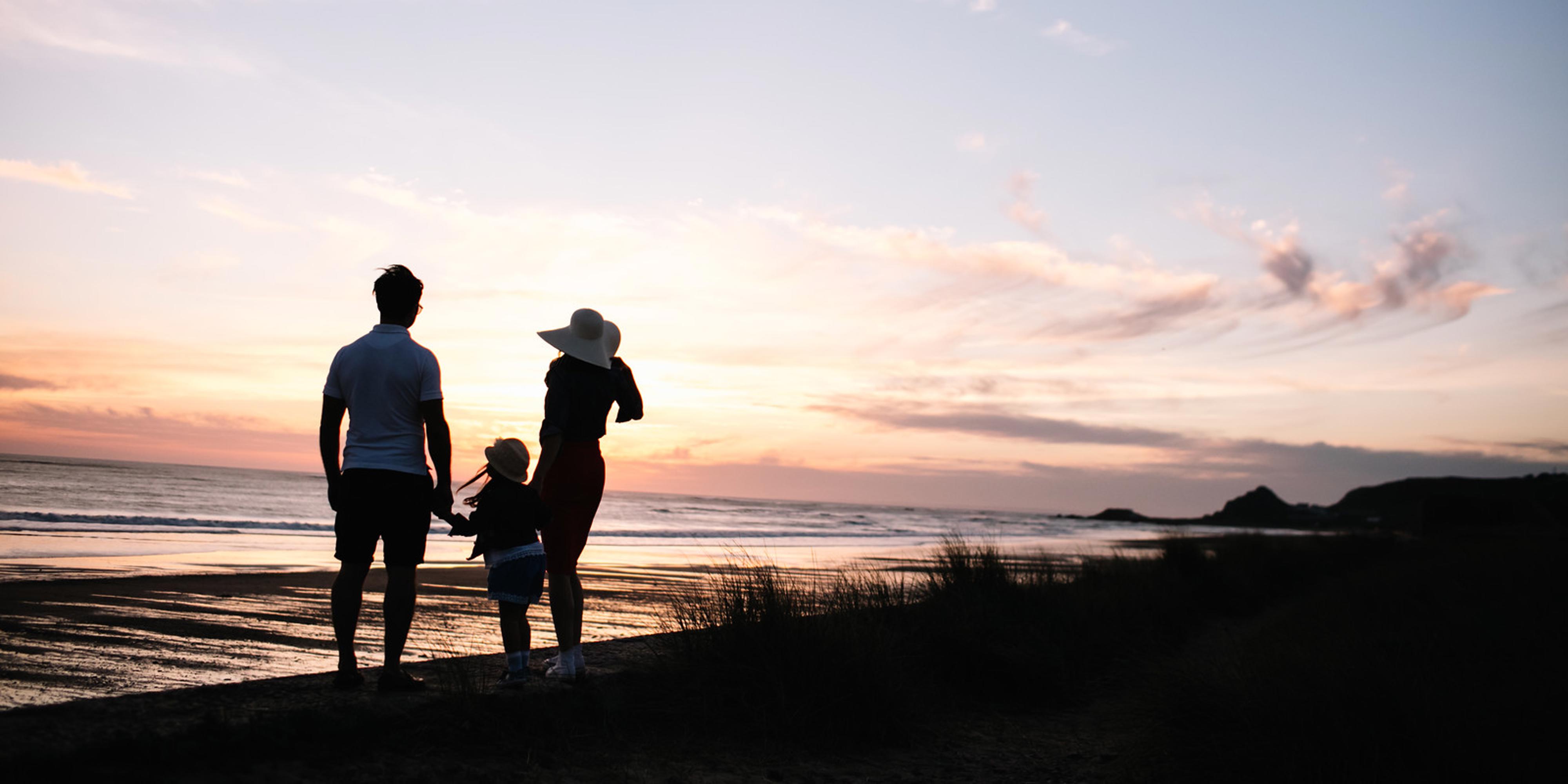 Family watching sunset