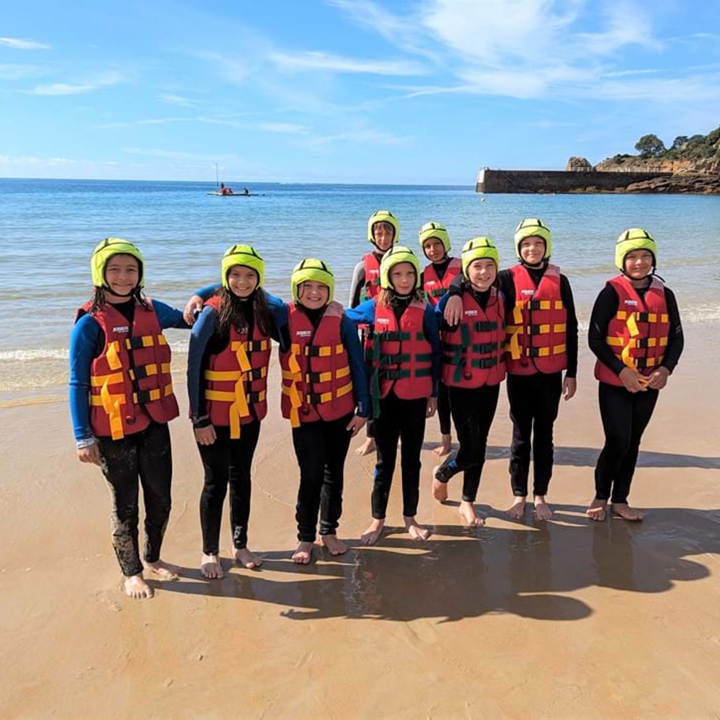 Kids experiencing coasteering at Greve de Lecq