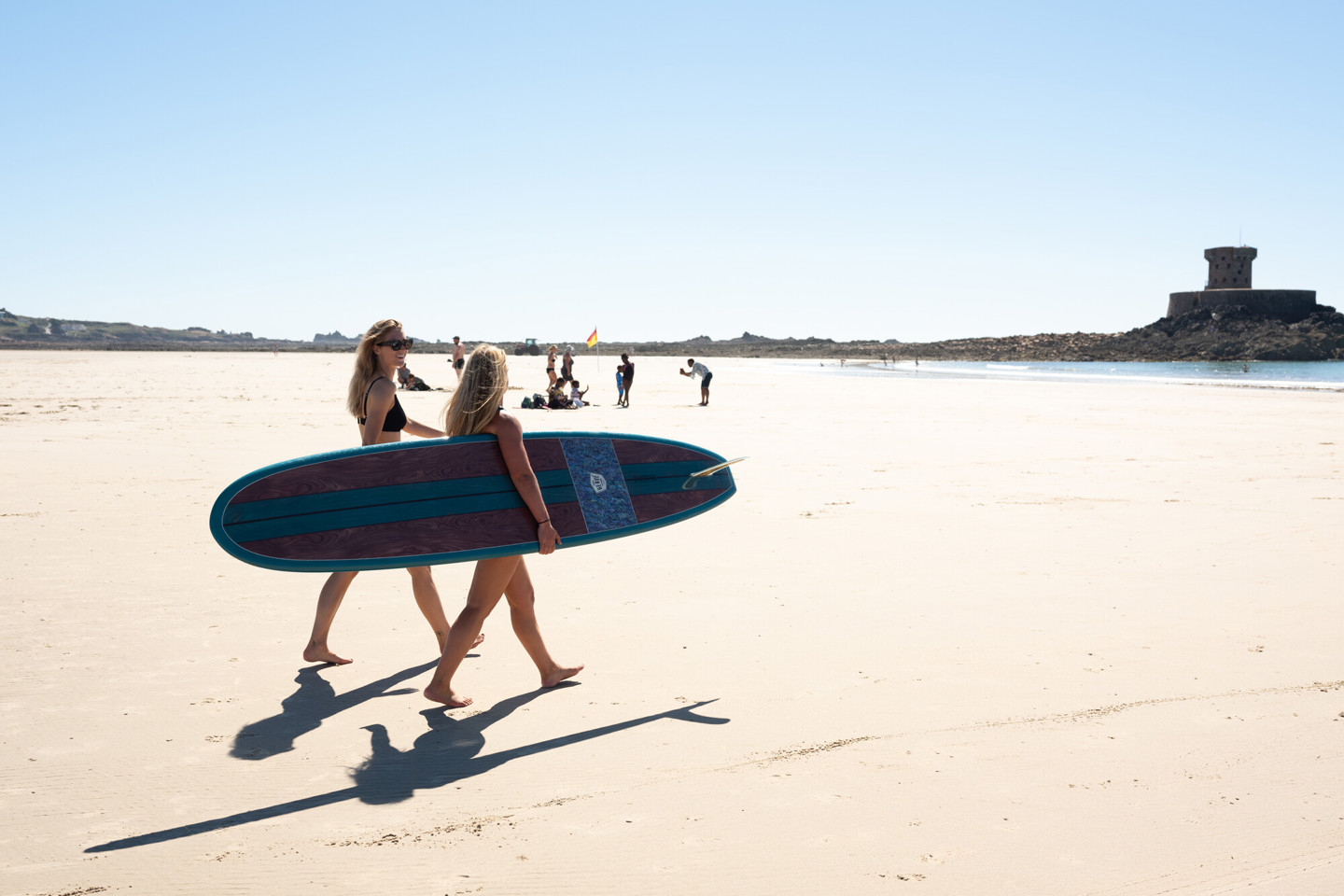 Girls paddle boarding